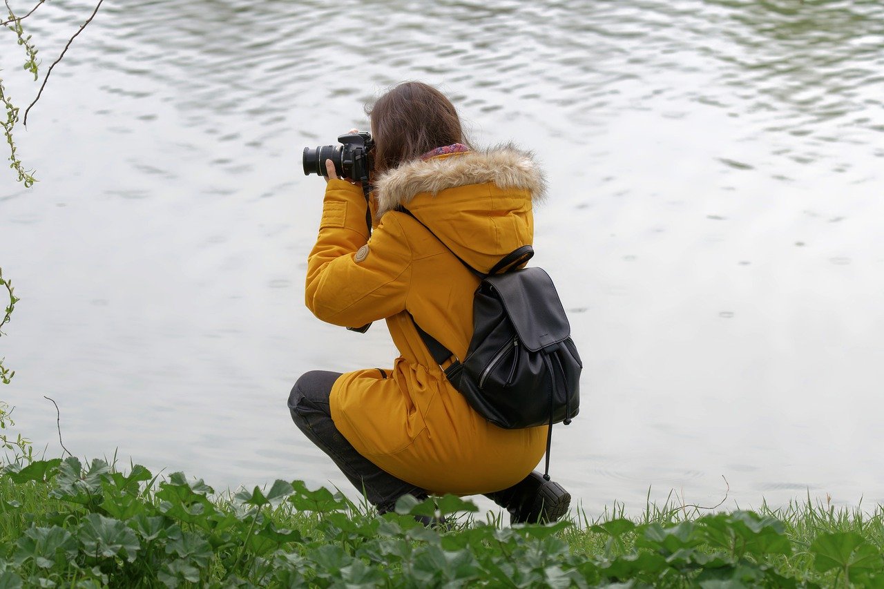 Photographer by a Lake